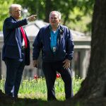 Trump unfurls plans for double 100-foot flagpoles during White House lawn walk