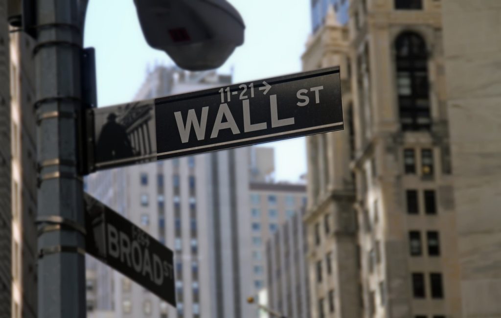 Wall Street opens flat as tariff jitters weigh on sentiment; Dow slips into red